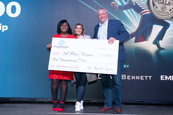 3 people holding a giant check, Smart girls program