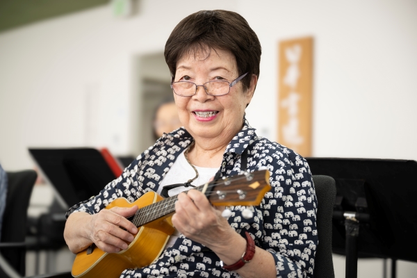 Woman playing Ukulele, Japanese American Cultural and community center