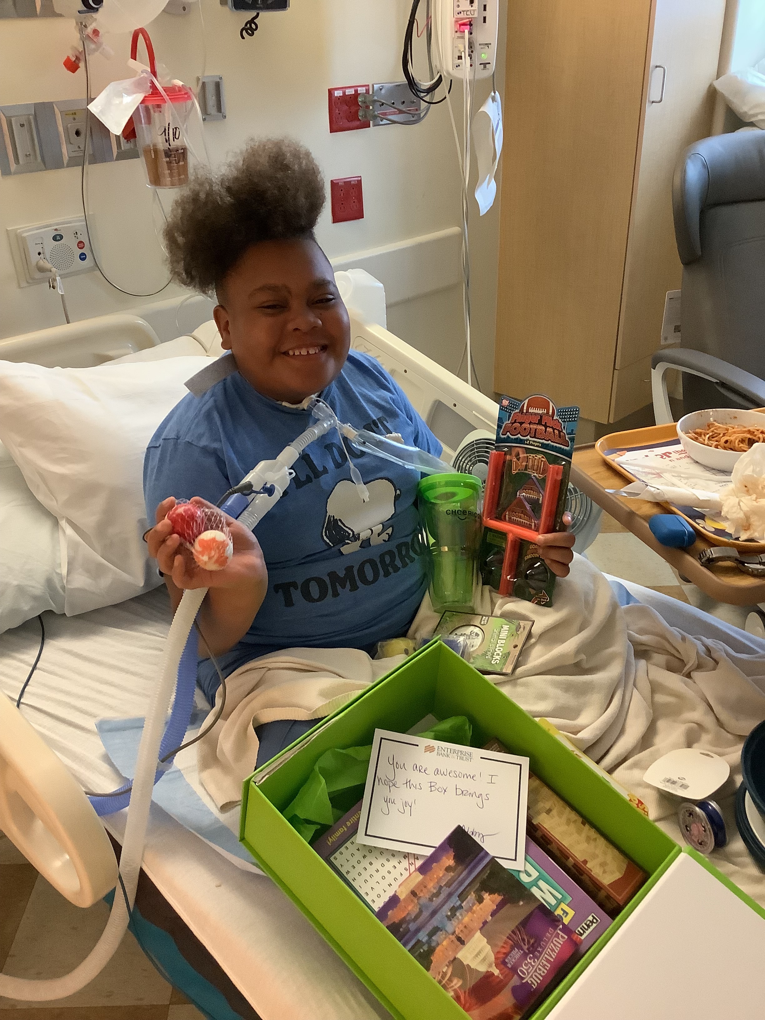 Cheeriodicals care packages, child in hospital bed