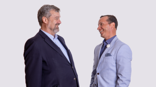 Two men talking about Consultative-vs-Transactional_BlogHeader