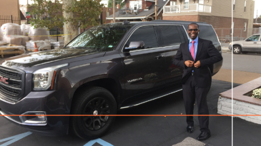 Man standing in front of a large SUV