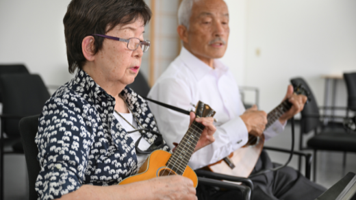 Woman and man playing Ukuleles, Japanese American Cultural & Community Center