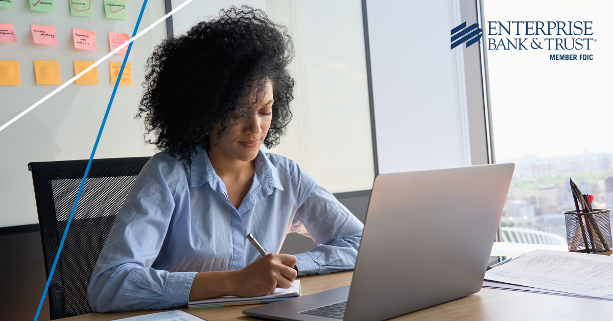 Woman working at a laptop