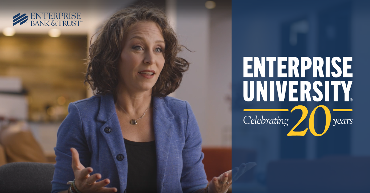 Enterprise University 20th edition logo and woman speaking