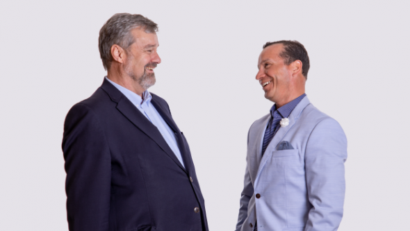 Two men talking about Consultative-vs-Transactional_BlogHeader