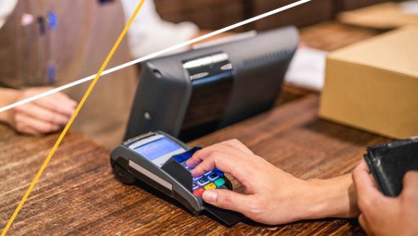 hand on payment processor machine, merchant services, Enterprise Bank & Trust