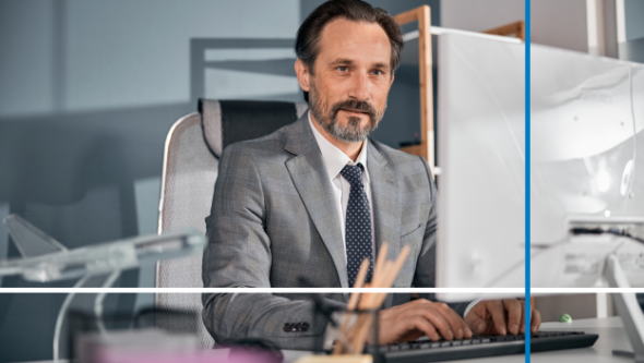 Man typing on a computer, streamline payables process