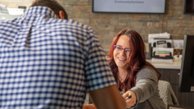 woman speaking to a man