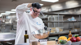 Chef in kitchen, M Culinary Concepts