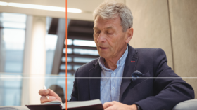 Man writing in a journal