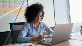 Woman working at a laptop