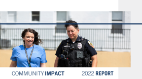 community impact 2022 report, two people walking and talking