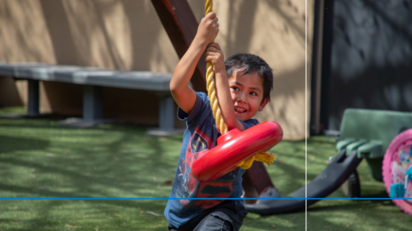 Child plays on a playground