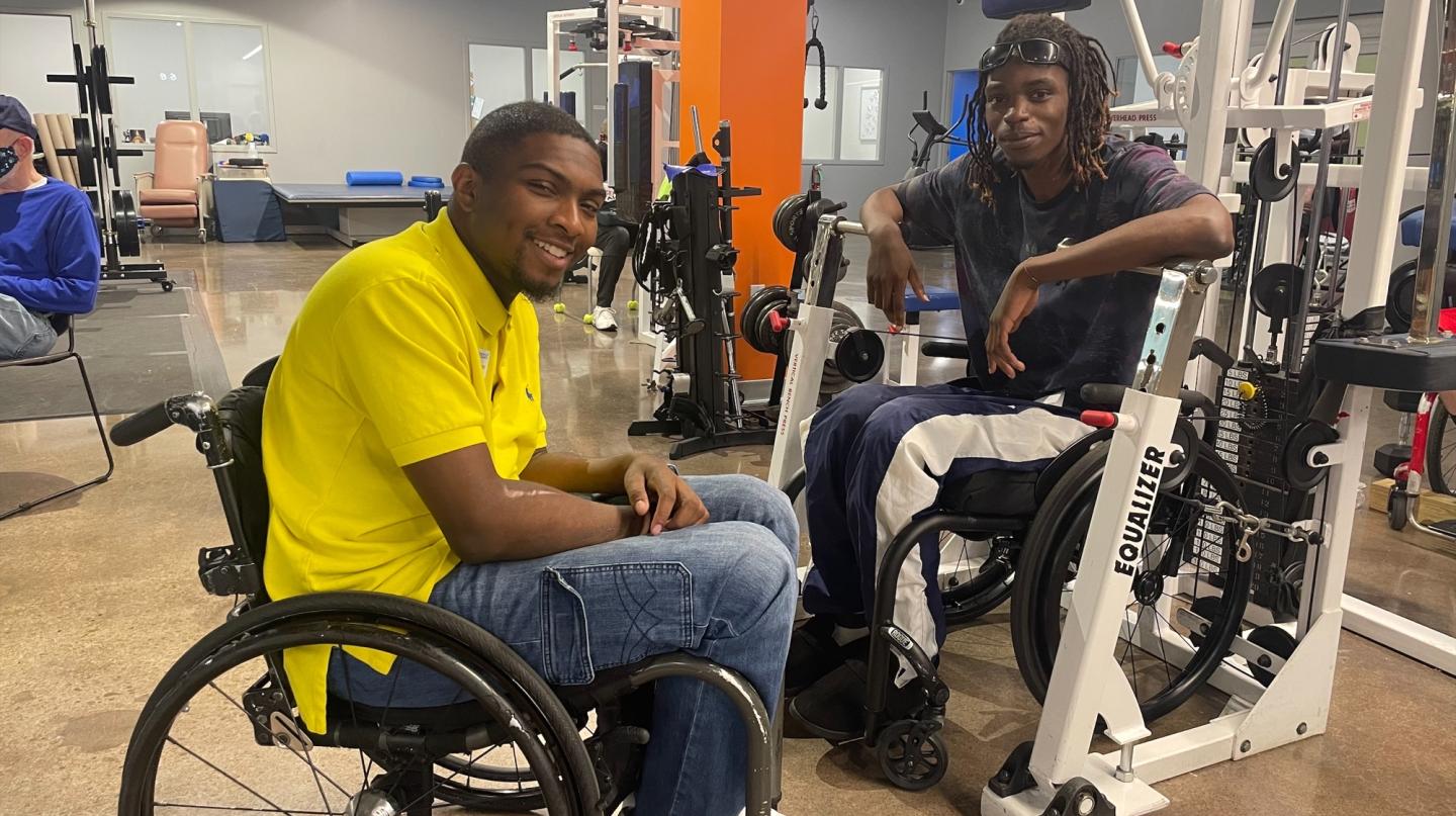 Paraquad disabled individuals working out