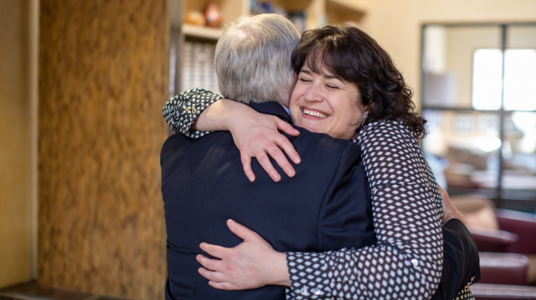 Man and woman hugging